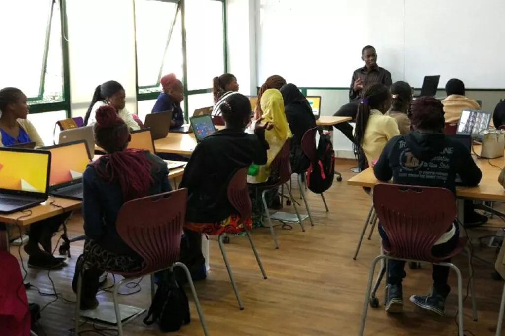 AkiraChix students partaking a class with laptops.