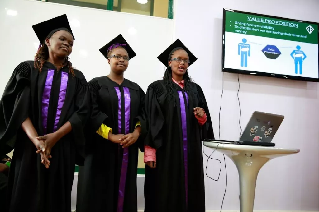 A group of AkiraChix students presenting their final project ahead of graduation.