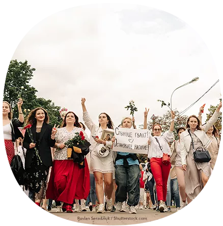 Women's Solidarity March. Women hold flowers and posters during peaceful protests as they walk around the city. Minsk, Belarus.