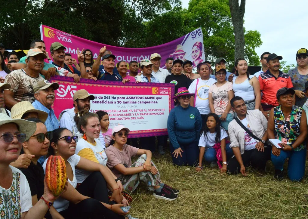 People holding a banner in Colombia.