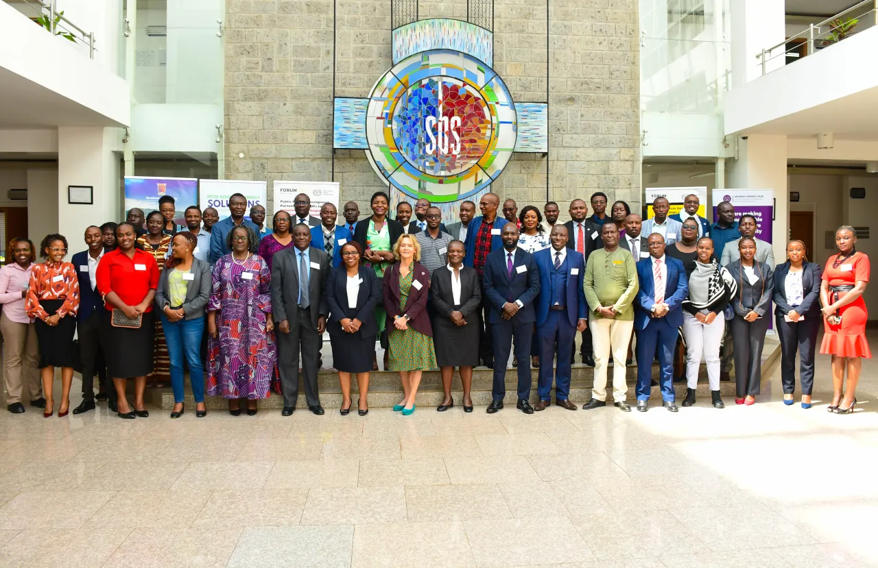 Multi-stakeholder forum on community engagement models in development group photo. Multi-stakeholder forum on community engagement models in development group photo.