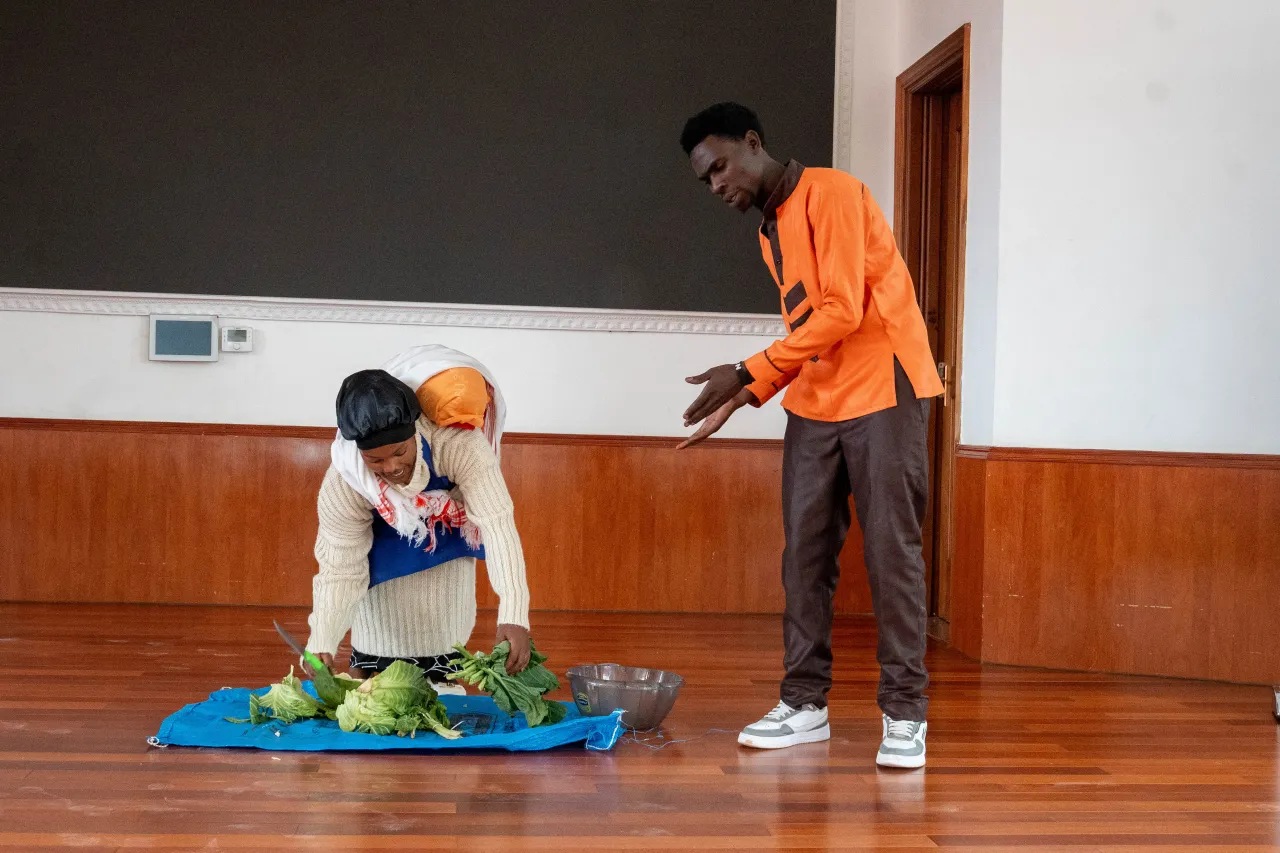 Image 1: A skit illustrating the plight of nursing mothers working in the market setup