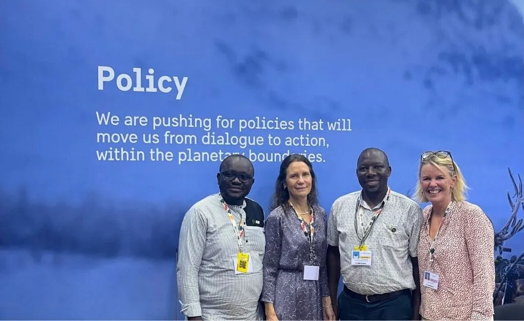 Jackson Obare, Regional Manager and Michael Nyongesa, Environment and Climate Justice Officer, at a meeting in the Swedish Pavilion with Louise Herrmann, Lead Policy Specialist, Environment and Climate, and Annika Otterstedt, Deputy Director at Sida.
