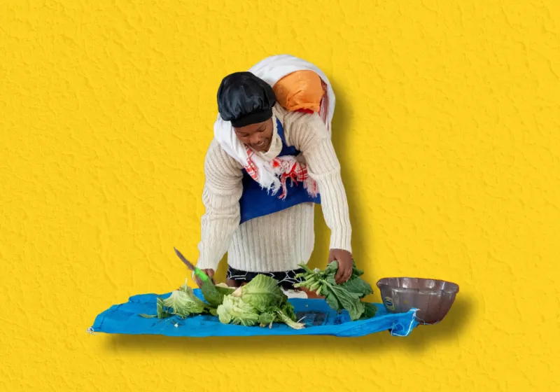 Image of a woman selling groceries